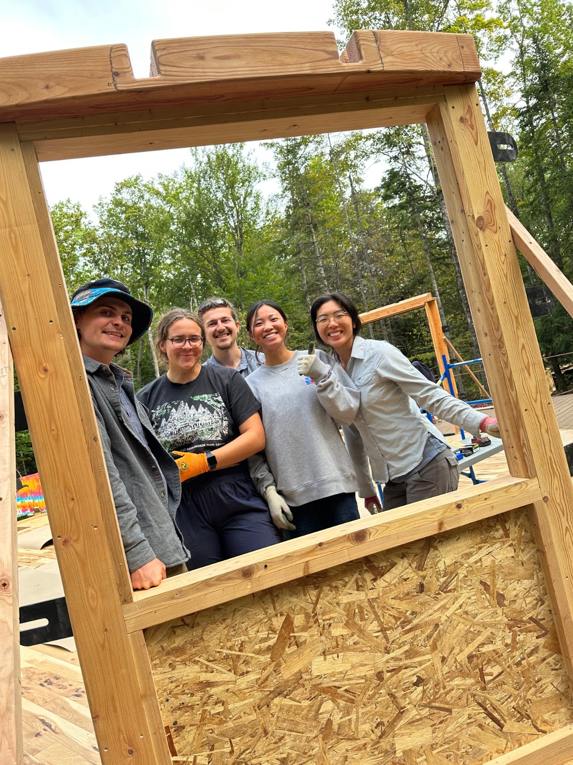 Group building the yurt